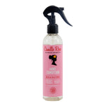 Pink bottle of Camille Rose Mint Condition hair and scalp spray on a white background