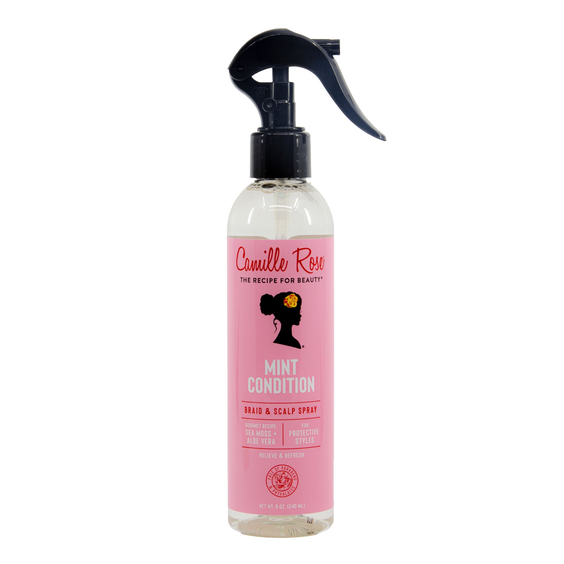 Pink bottle of Camille Rose Mint Condition hair and scalp spray on a white background