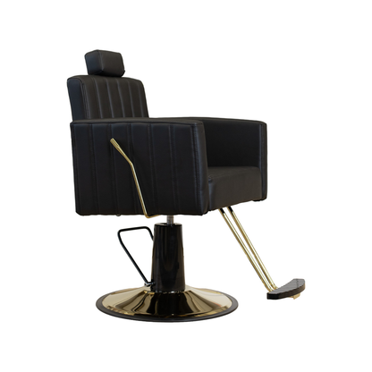 Black barber chair with gold accents on a white background