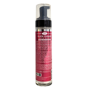 A bottle of LNC Hair Quick Cleanse House Shampoo with a black pump and clear cap, featuring a pink and white label, on a solid white background.