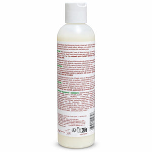 A white plastic bottle of hair developer (pH 12) with a white cap, showing the detailed Spanish product instructions and ingredients on the back label.