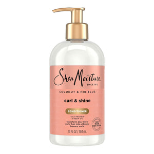 Shea Moisture Coconut & Hibiscus Curl & Shine Conditioner in a 15 fl oz clear bottle with a peach-pink label and a gold pump dispenser, shown on a white background.