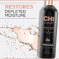 CHI Luxury Black Seed Oil Blend conditioner bottle with moisture replenishment text and oil splash on a light background