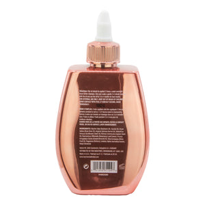 Rose gold bottle with a white cap on a white background