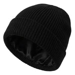 Black knit beanie with satin lining on a white background