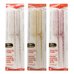 Three packages of Glitter Pallettes bone tail comb with red and white design.