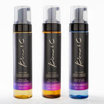 Three bottles of Kim & Co hair care products on a white background