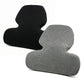 Black and gray back pillows on a white background