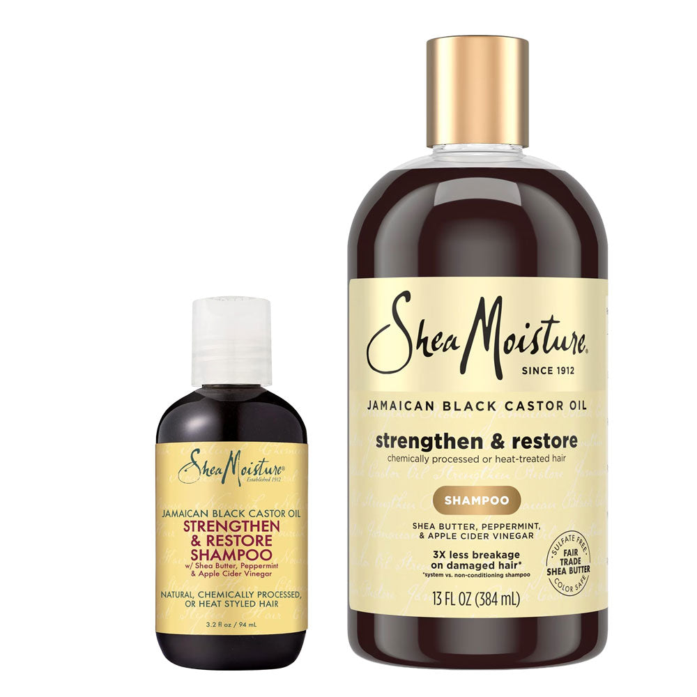 SheaMoisture Jamaican Black Castor Oil Shampoo in a 13 fl oz bottle next to a smaller 3.4 fl oz bottle of the same product, both with cream-colored labels and dark brown liquid, on a white background.
