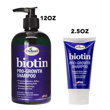 Two bottles of Difeel Biotin Pro-Growth Shampoo, one large and one small, on a white background.