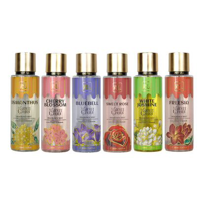 Set of seven floral-scented bottles with colorful labels on a white background