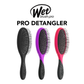 Three Wet Brush Pro Detangler brushes in black, purple, and pink on a white background.