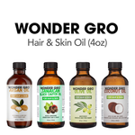 Four bottles of Wonder Gro hair and skin oil with labels on a white background