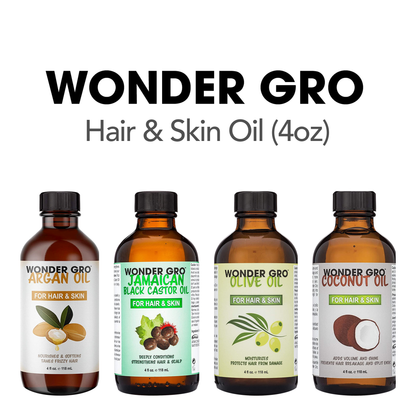 Four bottles of Wonder Gro hair and skin oil with labels on a white background