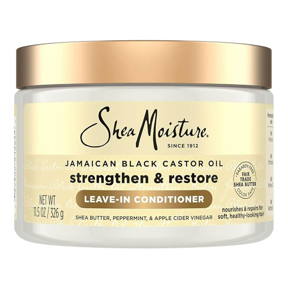 Shea Moisture Jamaican Black Castor Oil Leave-In Conditioner in a 11.5 oz white jar with a metallic gold lid and cream-colored label.