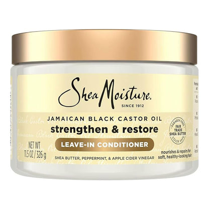 Shea Moisture Jamaican Black Castor Oil Leave-In Conditioner in a 11.5 oz white jar with a metallic gold lid and cream-colored label.
