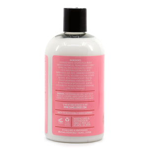 Bottle with pink label on a white background