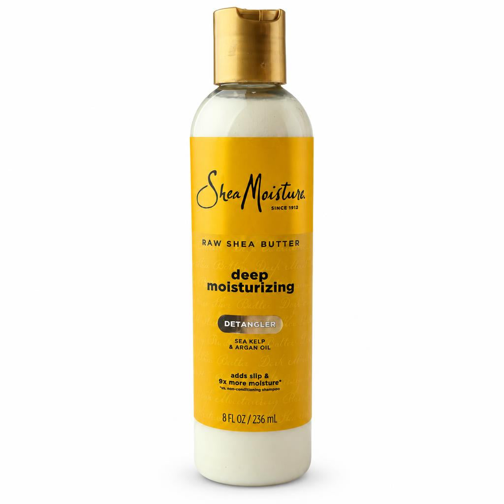 SheaMoisture Deep Moisturizing Detangler in a 8 fl oz bottle with a gold cap and yellow label, on a white background.