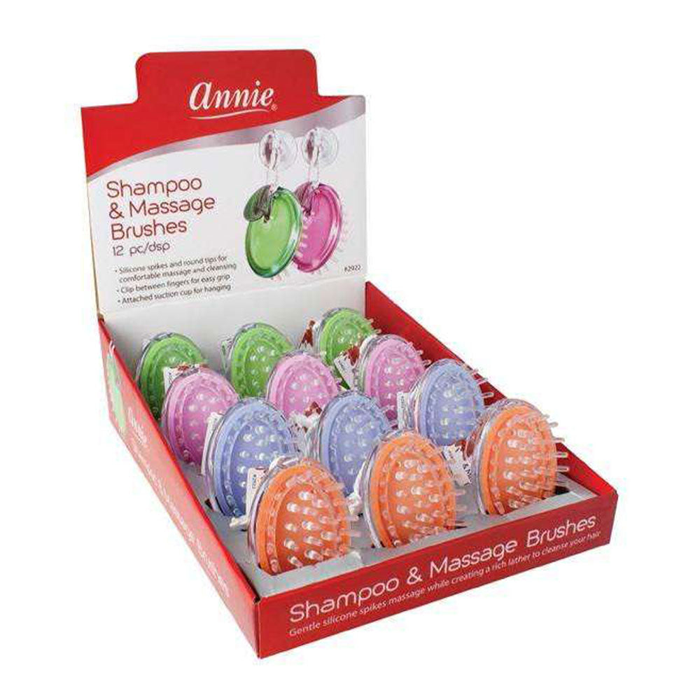 Annie brand Shampoo & Massage Brushes retail display box containing 12 colorful silicone hairbrushes in purple, blue, orange, and green, shown on a white background.
