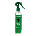 Camille Rose Rosemary Water daily restorative hair and skin spray in a clear bottle with a green trigger spray top and green label, shown on a white background.