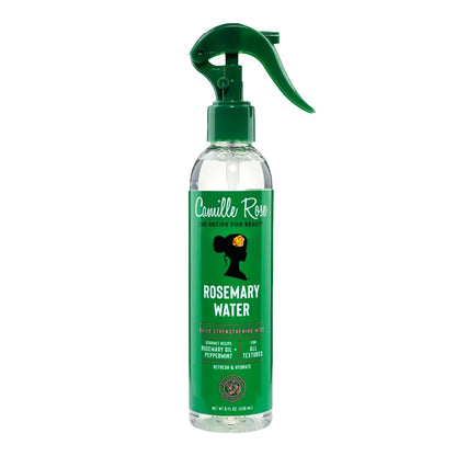 Camille Rose Rosemary Water daily restorative hair and skin spray in a clear bottle with a green trigger spray top and green label, shown on a white background.