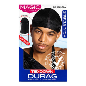 Durag hair covering in black from the Magic Collection, shown on its retail packaging card. The packaging features a model wearing the black tie-down durag, along with product details, a diagram of the cool nylon lining, and a 'Personal Fit, Approved' badge.